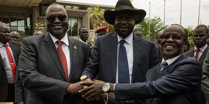 Riek Machar Teny-Dhurgon, First Vice-President of the Republic of South Sudan; President Salva Kiir; and James Wani Igga, Second Vice-President of the Republic of South Sudan join hands as the Transitional Government of National Unity is sworn in on April 2016 Photo Credit: UN Photo via Flickr (http://bit.ly/2anlXoG) CC BY-NC-ND 2.0
