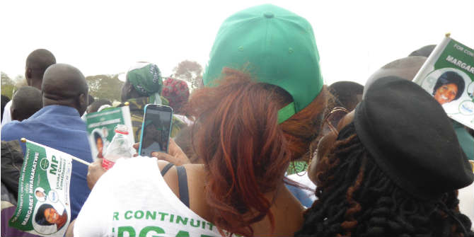 PF supporters posing for a selfie during a political rally in Woodlands stadium, Lusaka Photo Credit: Wendy Willems