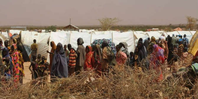 eople queuing to access the transit camp in Dolo Ado in 2011 Photo Credit: Cate Turton/Department for International Development via Flickr (http://bit.ly/2ceJTgA) CC BY 2.0