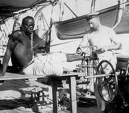 “Freeing a Slave from his Shackle on HMS ‘Sphinx’ off the East Coast of Africa 1907”