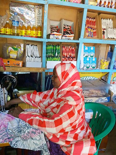 Shop owner in New Hargeisa now offering tailoring services Photo Credit: Nasra Jama