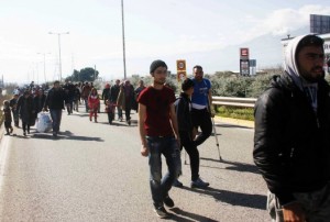 Refugees roaming Greece's central highways heading for the Greek borders
