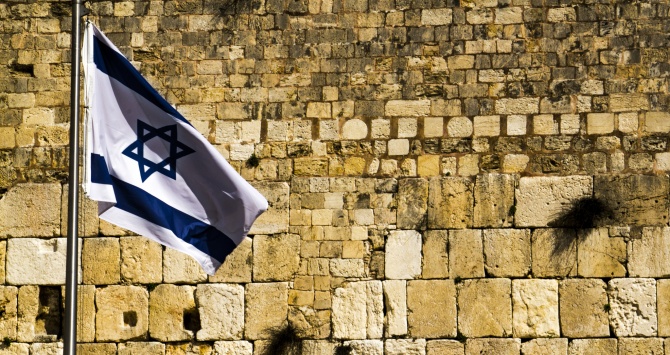Flag on the Wall, Israel. Photo Credit: Jack Zallum, via Flickr [https://www.flickr.com/photos/kaiban/7771323676/] License: CC BY-NC 2.0