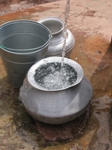Water filled metal urns