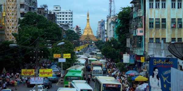 Image: Sule Paya Buddhist pagoda rises from the traffic in Yangon. Credit: McKay Savage CC BY 2.0