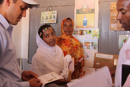 USAID Health extension workers at government health posts in Ethiopia register women and their families for a services including family planning. Credit: USAID U.S. Agency for International Development (Creative Commons BY NC)