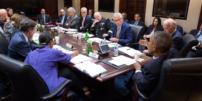 President Barack Obama and Vice President Joe Biden meet with members of the National Security Council in the Situation Room of the White House, Sept. 10, 2014. (Official White House Photo by Pete Souza)