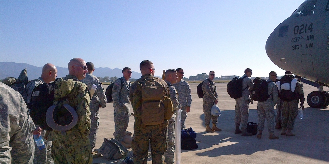 U.S. Army Africa, Joint Public Affairs Support Element, Joint Services Communications Element and 101st Airborne personnel supported by the 724th Air Mobility Squadron prepare to move people and equipment in support of Operation United Assistance near Pisa, Italy. The U.S. military is in support of USAID operations in response to the Ebola outbreak in West Africa. (U.S. Army Africa photos by Lt. Col. Michael Indovina)