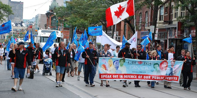 "Labour Day Parade Toronto September 2011" by CAW Media - Labour Day Toronto 2011 139Uploaded by Skeezix1000. Licensed under CC BY 2.0 via Wikimedia Commons 