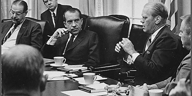 Official White House photograph of Minority Leader Gerald Ford in meeting with Richard Nixon. Obtained Ford Presidential Library.