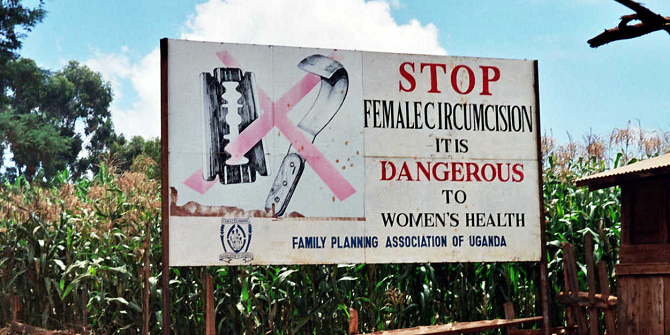 Road sign in Uganda campaigning to end female genital mutilation